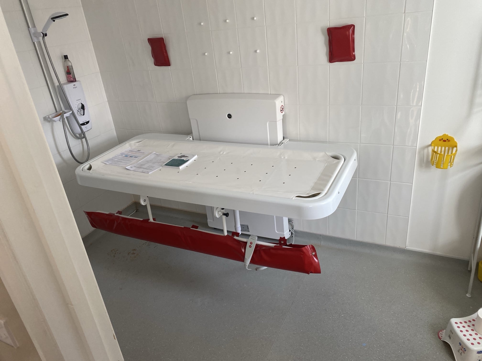 Image of a Pressalit SCT2100 changing table installed by Candor Care