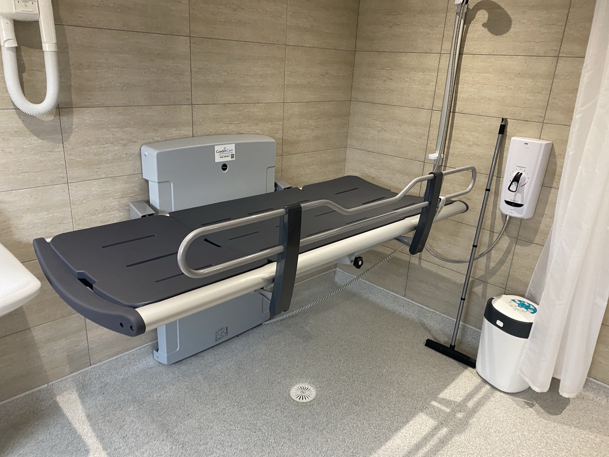 Image of a Pressalit SCT3000 changing table installed by Candor Care